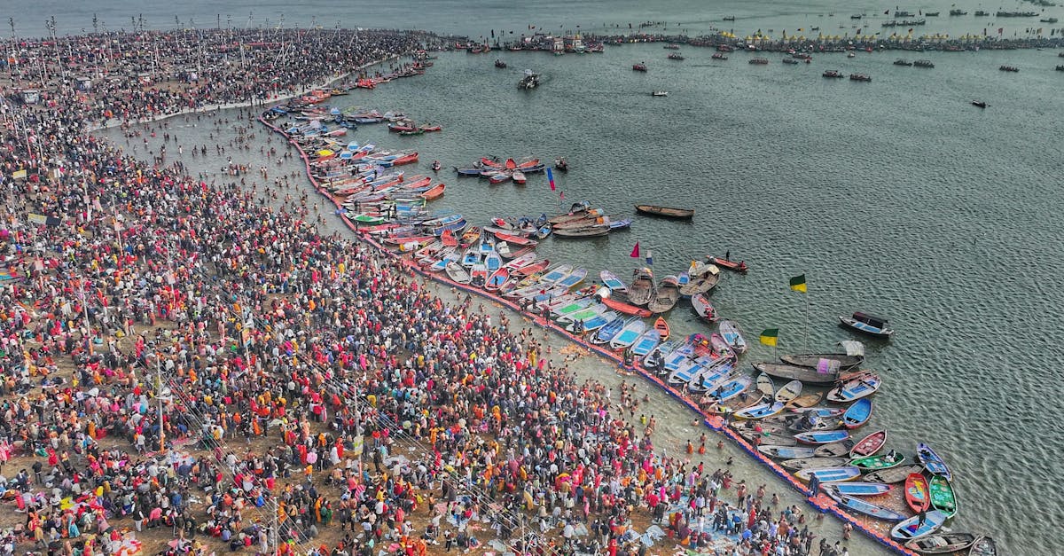 Arial view of crowds and boats during Kumbh Mela at Triveni Sangam, Prayagraj.