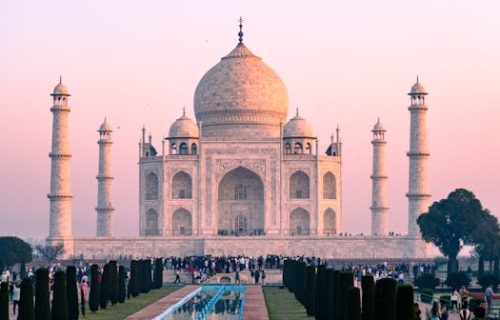 The iconic Taj Mahal during sunset, showcasing its majestic architecture and captivating beauty.